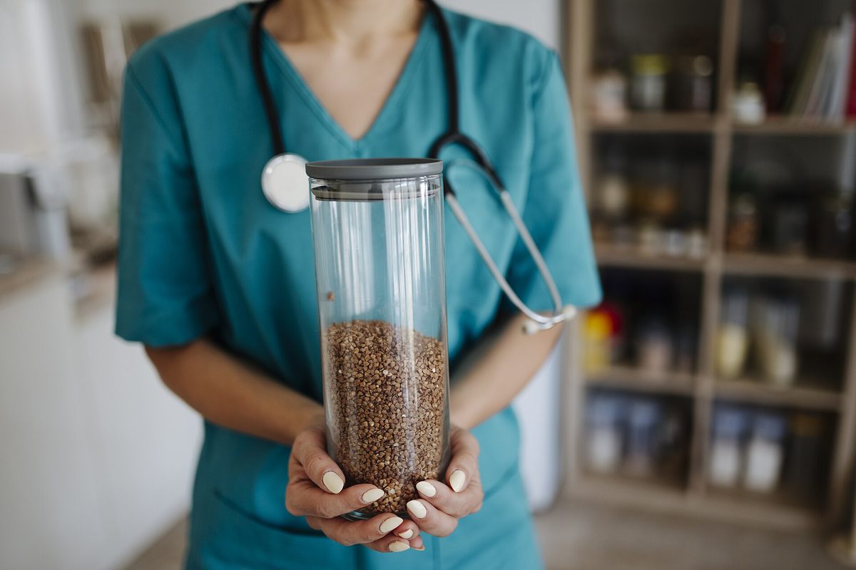 A nurse wearing scrubs